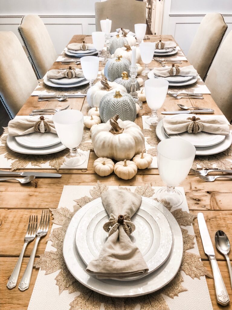 fall tablescape with white and cream pumpkins