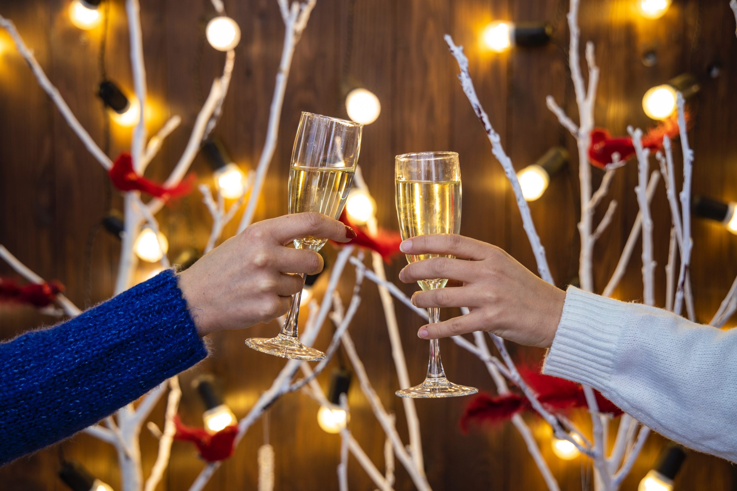 contactless holiday entertaining lights and champagne