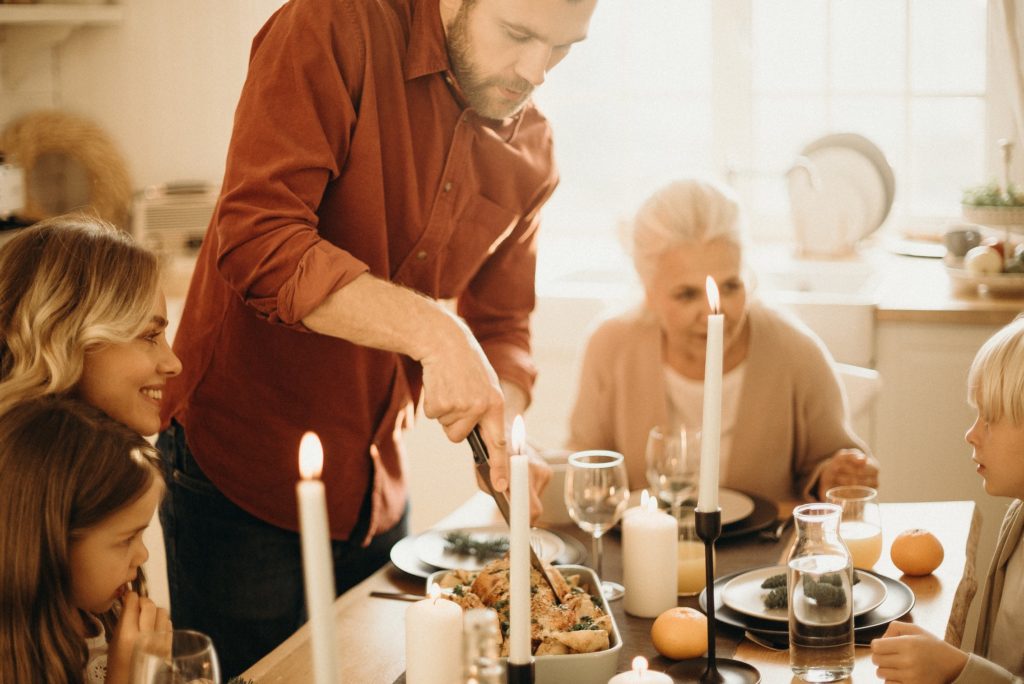 family eating easter brunch around the table