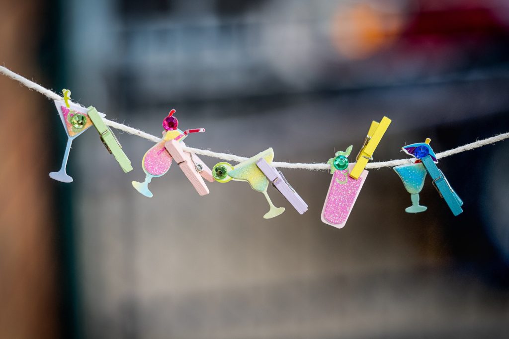 small house party decor on pegs