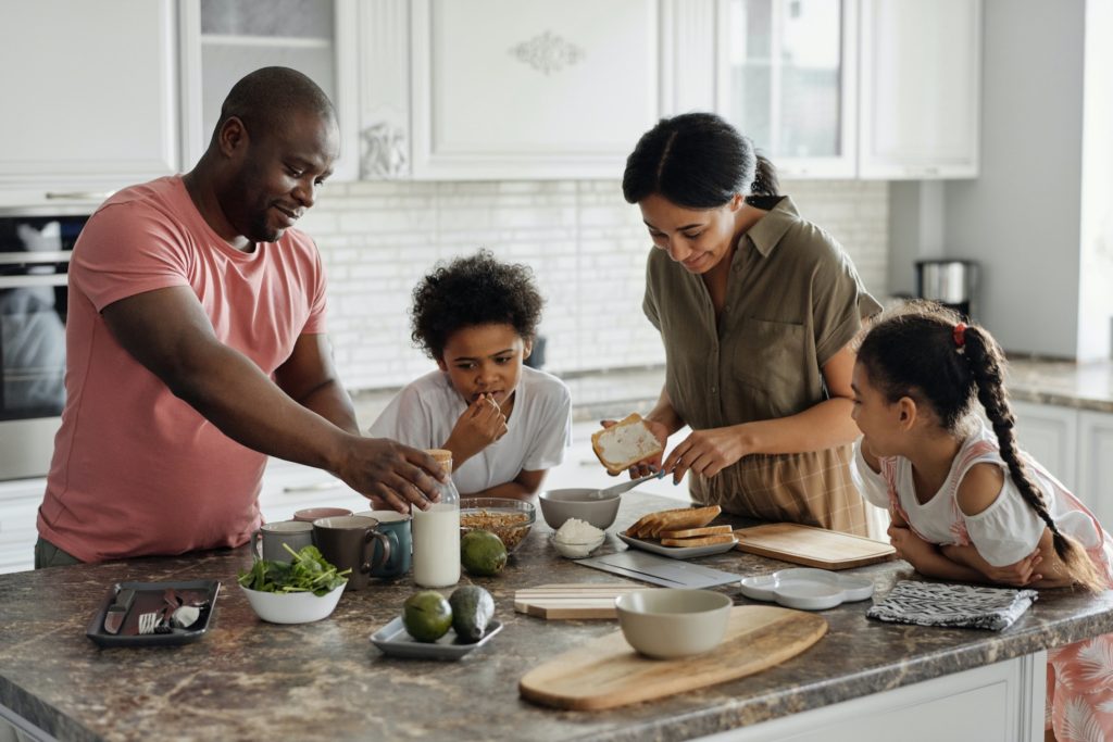 a family making food together