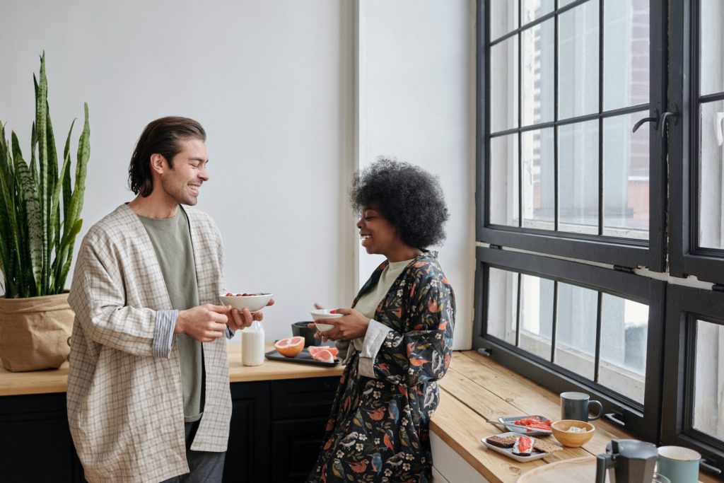 two people talking over breakfast