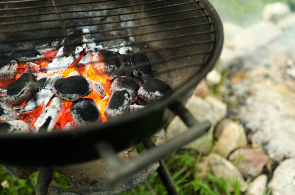 close up of a lit bbq