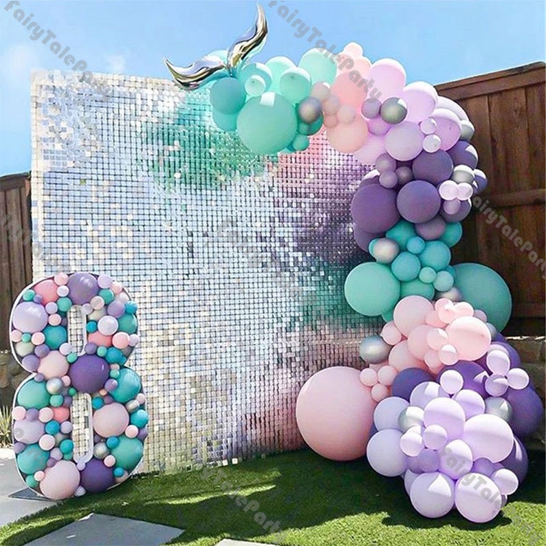 mermaid backdrop and balloons