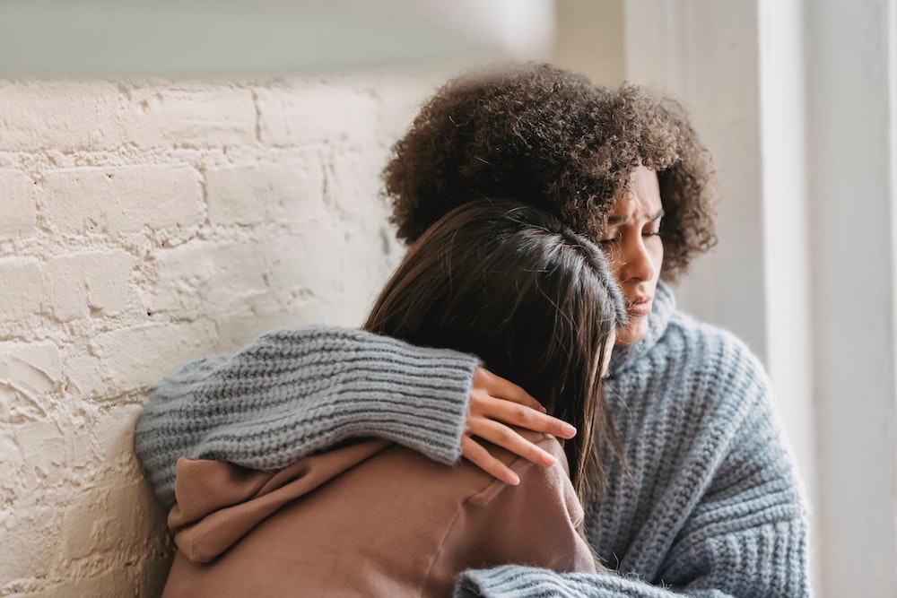 two people hugging