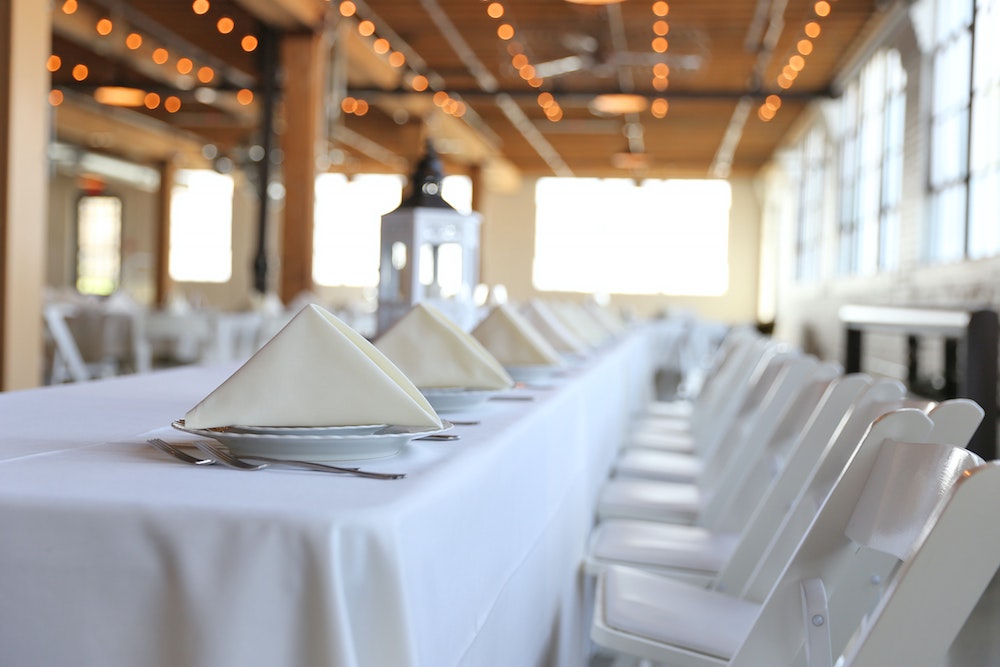 empty wedding venue with string lights 