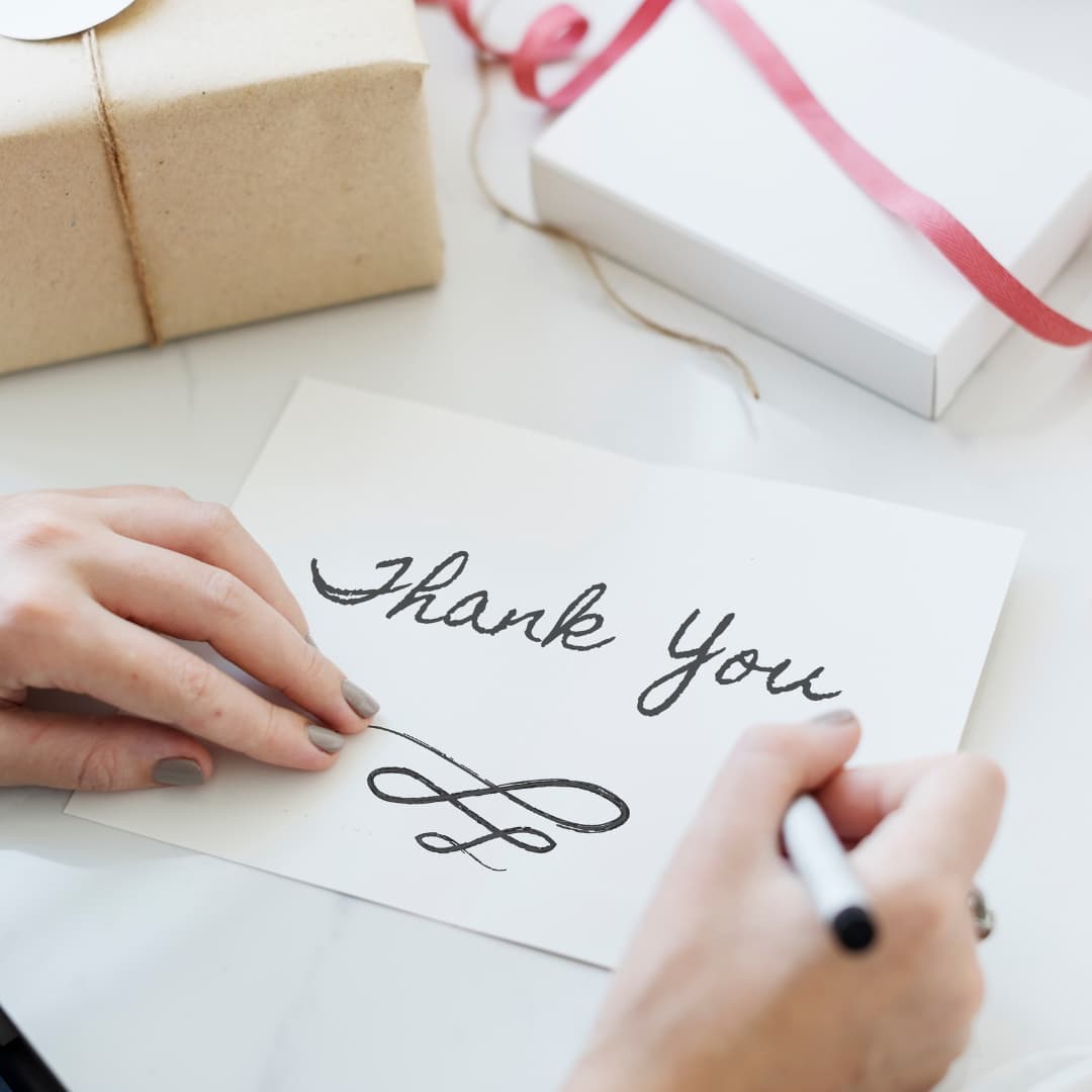 event planner writing thank you cards