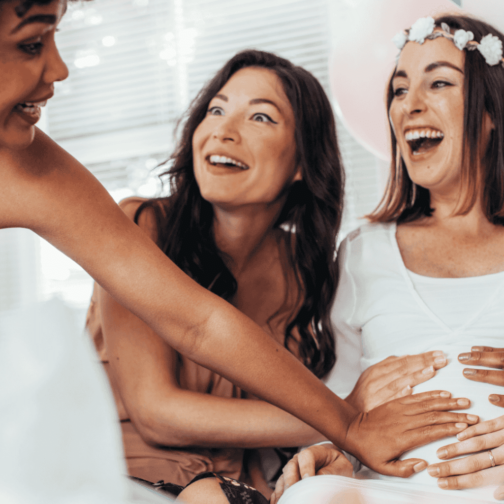 guests playing the tummy measurement game at a baby shower