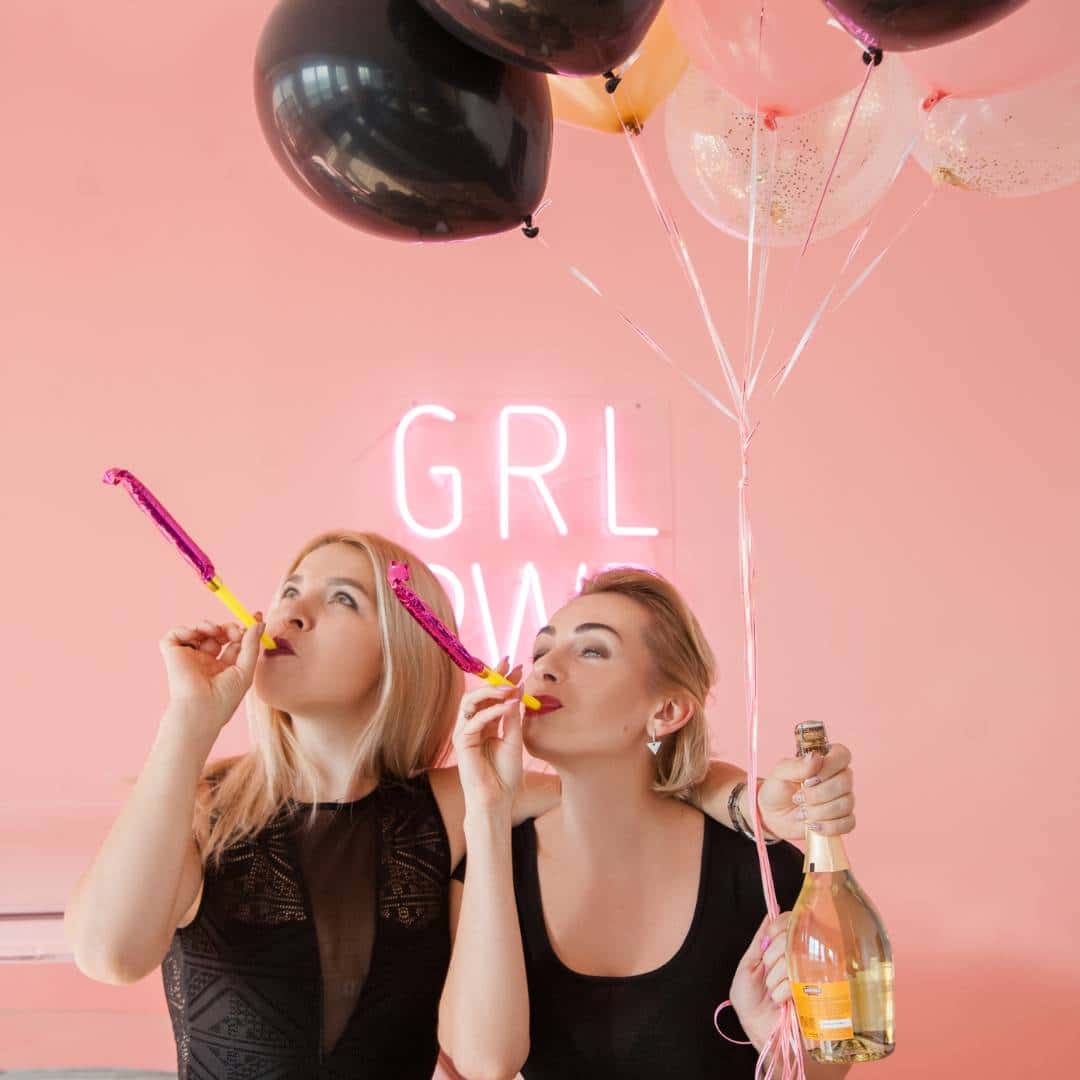 girls at a bridal shower playing bridal shower games