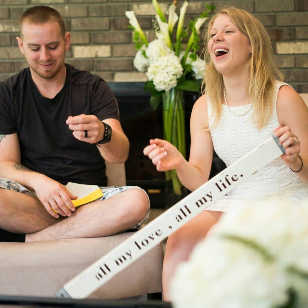 bride and groom playing bridal shower games