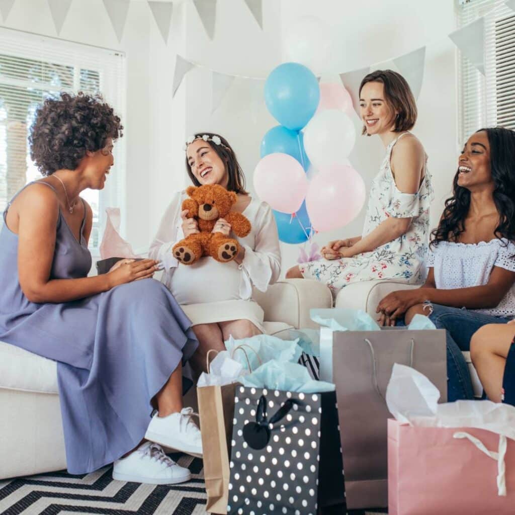 women playing games at a baby shower