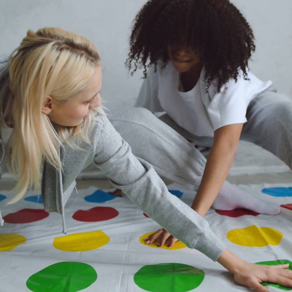 playing baby pump twister game at a baby shower