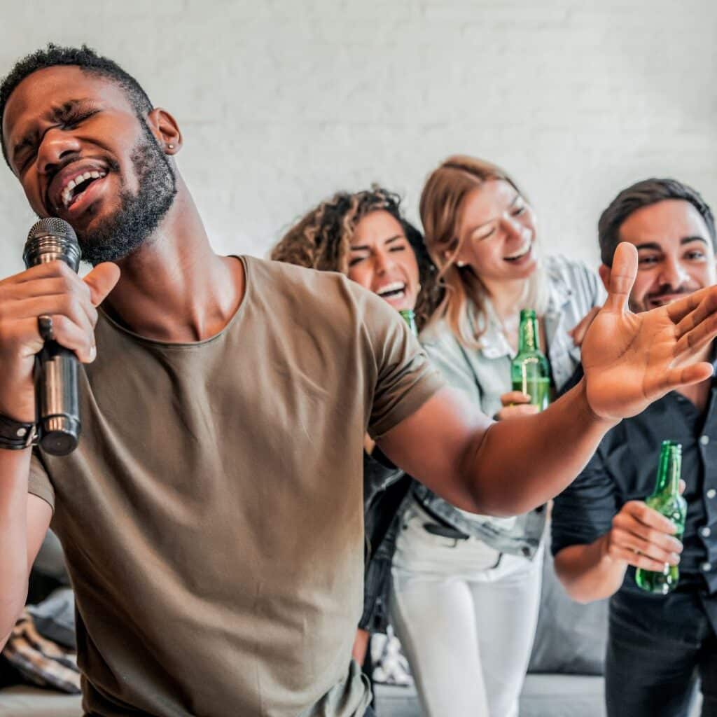 friends having a last minute karaoke party